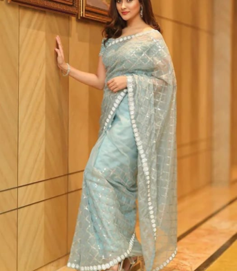 এক্সক্লুসিভ ইন্ডিয়ান সফট পেস্ট অরগাঞ্জা ফেব্রিকের মধ্যে গর্জিয়াস  সিকুয়েন্স এমব্রয়ডারি কাজ করা পার্টি শাড়ি