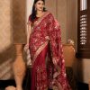 মেরুন কালার সফট চিনিগুড়া সিল্ক ফেব্রিক এমব্রয়ডারি কাজ করা পার্টি শাড়ি।